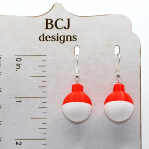 Pair of earrings shaped like red and white fishing bobbers with silver hooks.