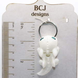 White Fury dragon keychain with sleek white design