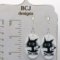 Pair of “I’m Fine” cat earrings showing a cartoon cat on fire.