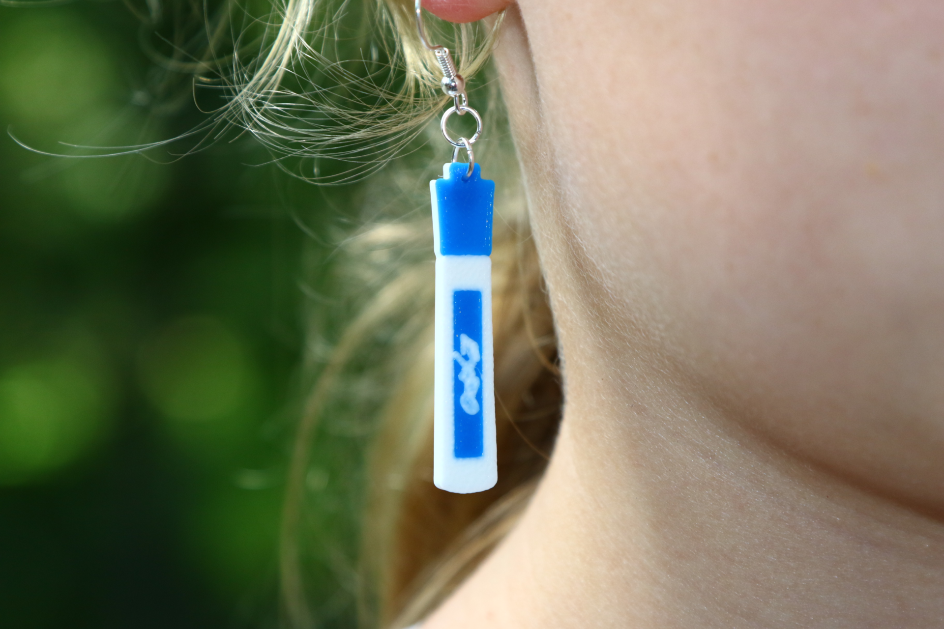 Pair of earrings shaped like colorful Expo dry-erase markers.
