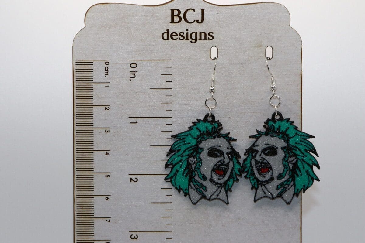 Beetlejuice-inspired earrings, spooky Halloween-themed accessory