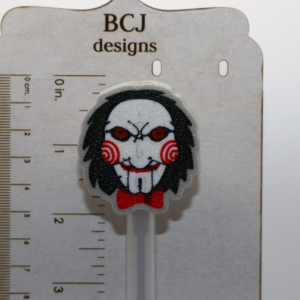Jigsaw straw topper featuring detailed puppet face design.