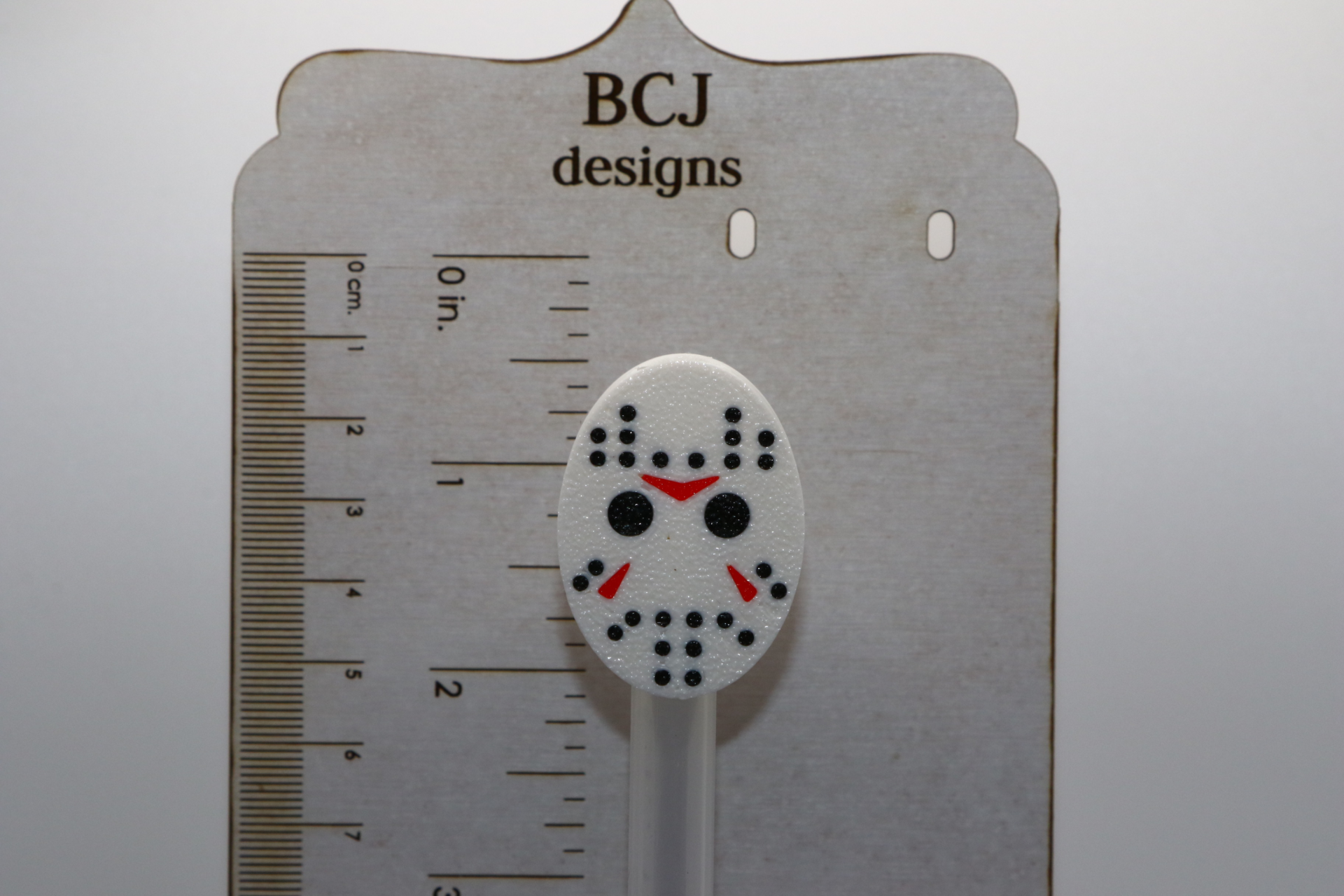 Jason Voorhees straw topper with white hockey mask design.