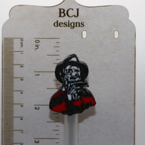 Freddy Krueger straw topper with red and green striped design.