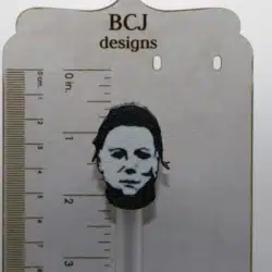 Michael Myers straw topper with white mask design.