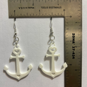Pair of silver anchor-shaped earrings with small loop details.