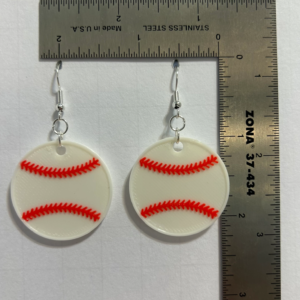 Pair of earrings shaped like a white baseball with red stitching.