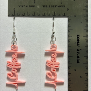 Coffee heartbeat earrings with cup and heartbeat design.