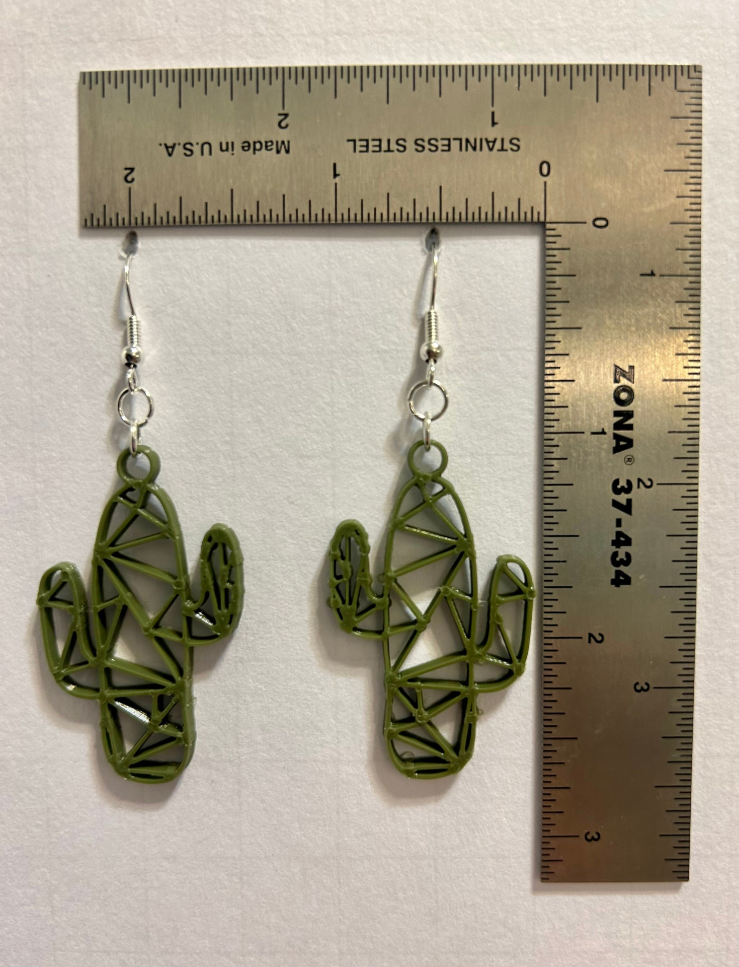 Geometric cactus-shaped earrings with modern design.
