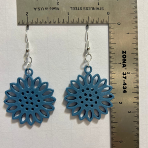 Single color daisy earrings with uniform petals and minimalist design.