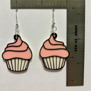 Cupcake earrings with colorful icing and sprinkles.