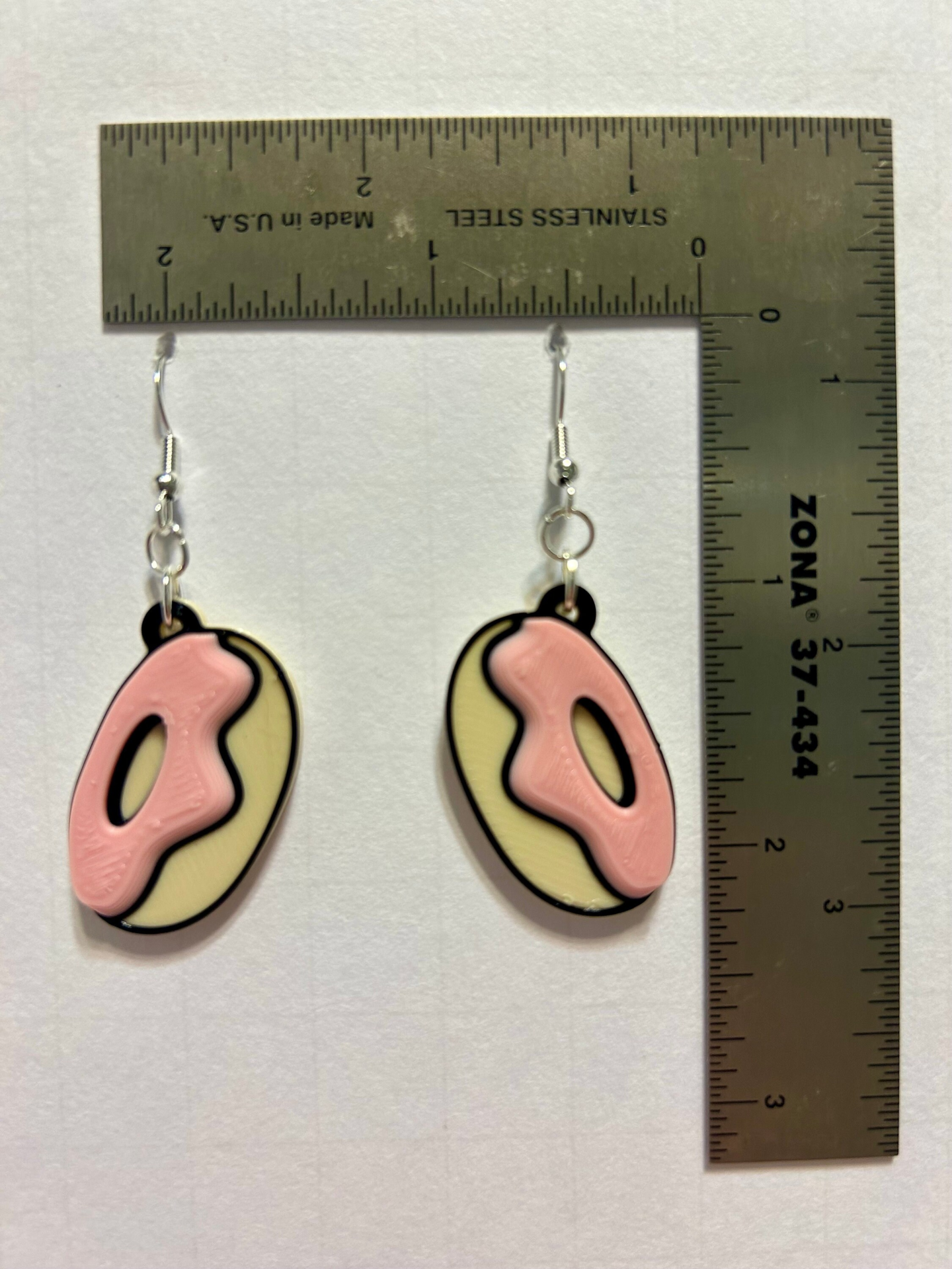 Frosted donut earrings with colorful icing