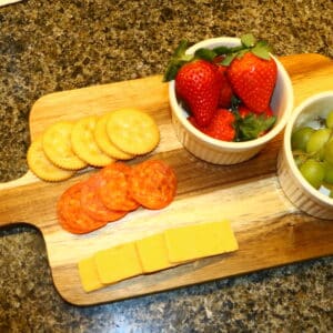 Valentine Charcuterie Board featuring “Two Hearts, One Love, Endless Memories” engraving with heart, bird, and rose border