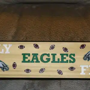 Fly Eagles Fly Sign engraved and painted on poplar wood with 3D footballs and Eagles logo
