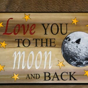 Laser engraved wood wall signs displayed in a home décor setting
