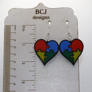 Autism Awareness Earrings featuring a recognizable support design promoting acceptance and donated to the Autism Society of America