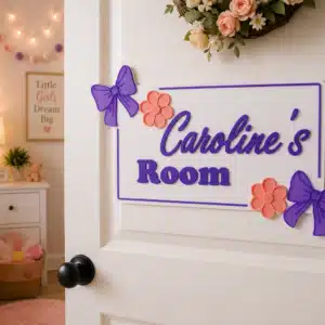 Personalized girls room 3D printed name sign featuring a custom name with decorative bows and flowers for bedroom décor.
