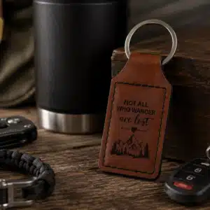 Personalized Premium Leatherette® keychain shown in an available color with custom laser engraved design and silver split key ring.